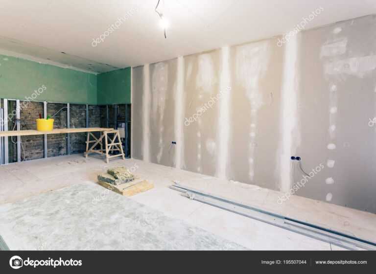 Working process of installing metal frames and plasterboard (drywall) for gypsum walls and materials are in apartment is under construction, remodeling, renovation, extension, restoration and reconstruction